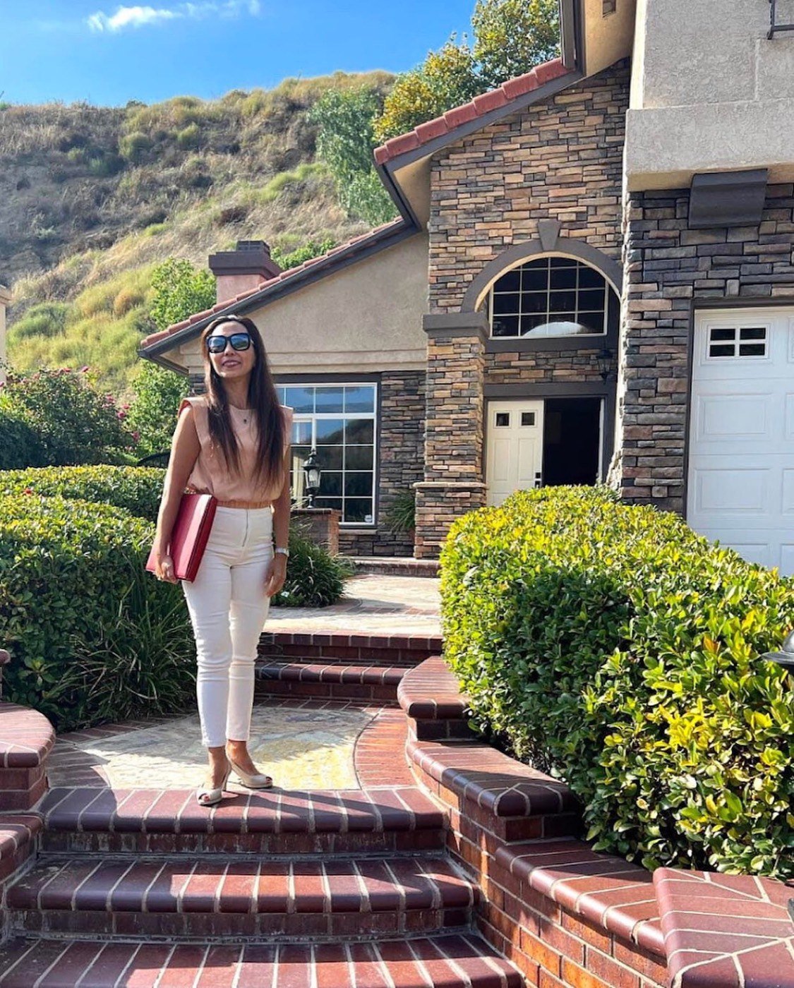 Master Judith outside a home during residential property work